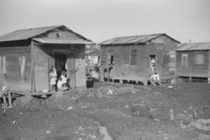 Two Houses in The Slums of El Fangitto